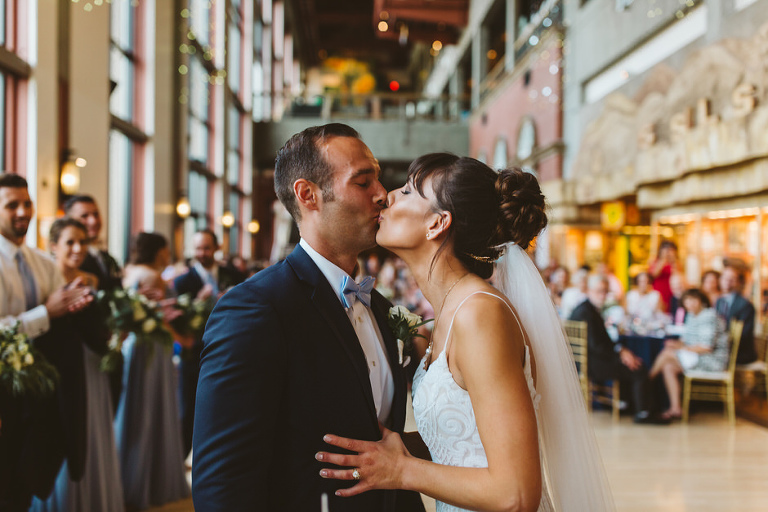 couple kissing at Grand Rapids Public Art Museum Wedding 