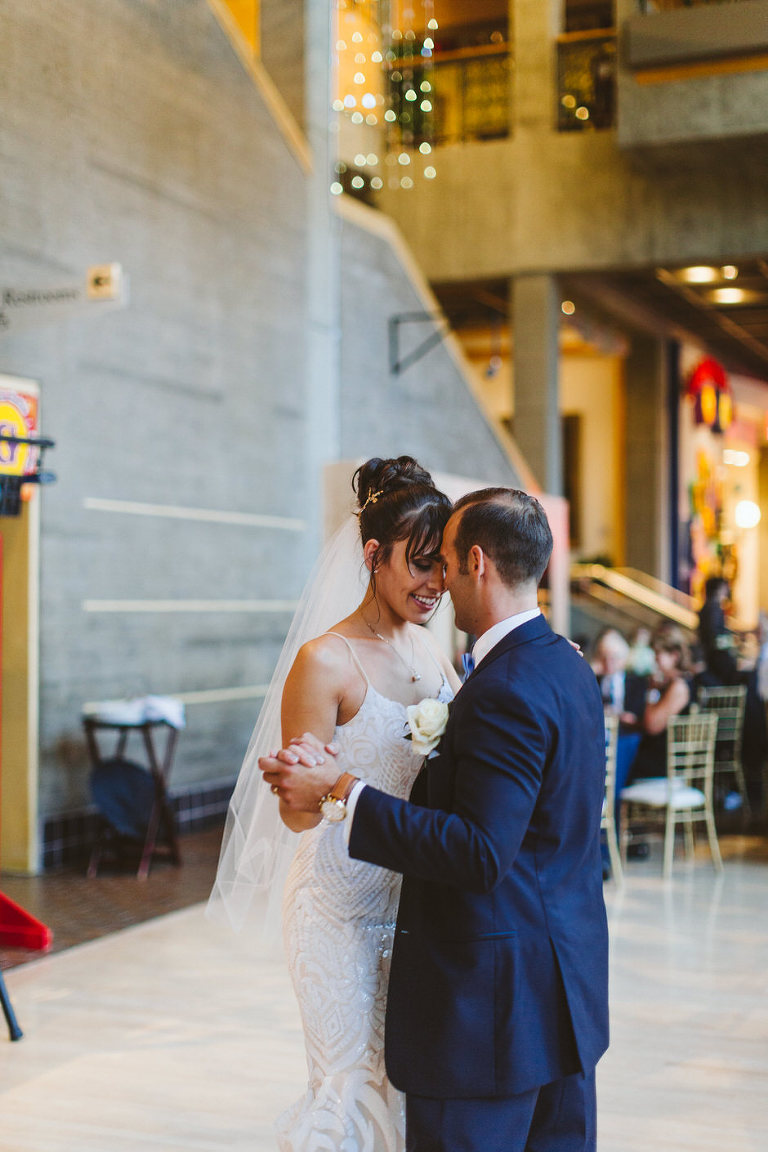 couples first dance at Grand Rapids Public Art Museum Wedding 