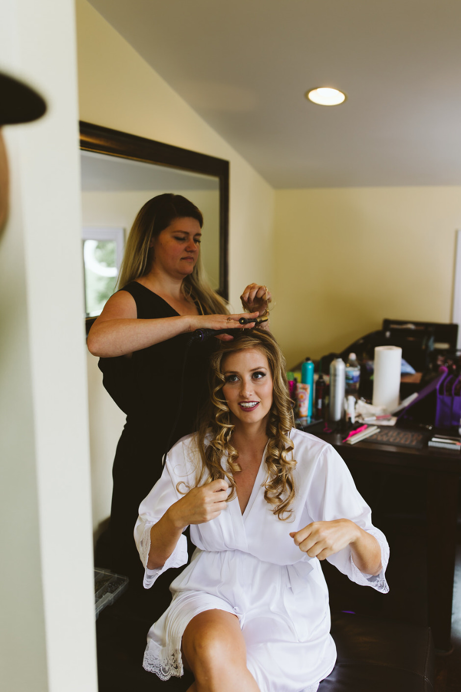 bride getting hair done 